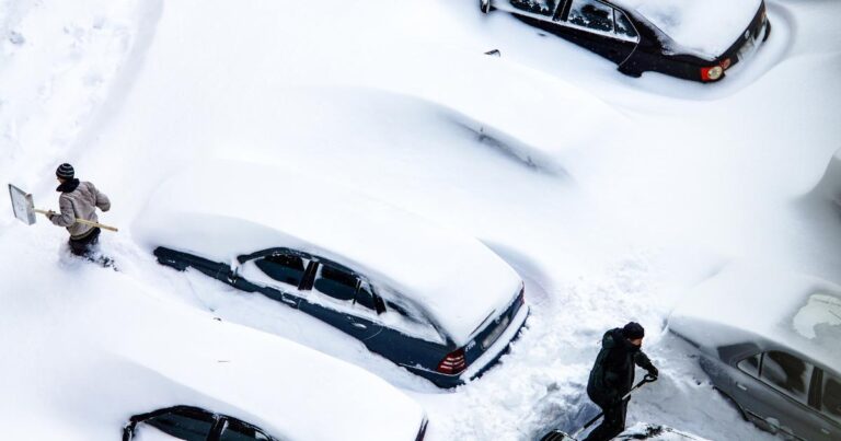 parking lot buried in snow