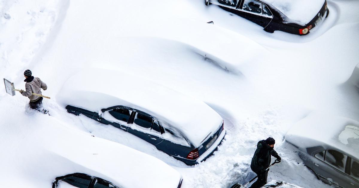parking lot buried in snow