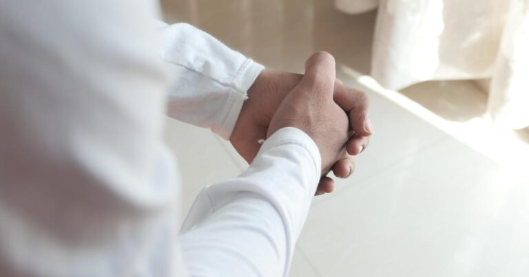 worried person wringing hands