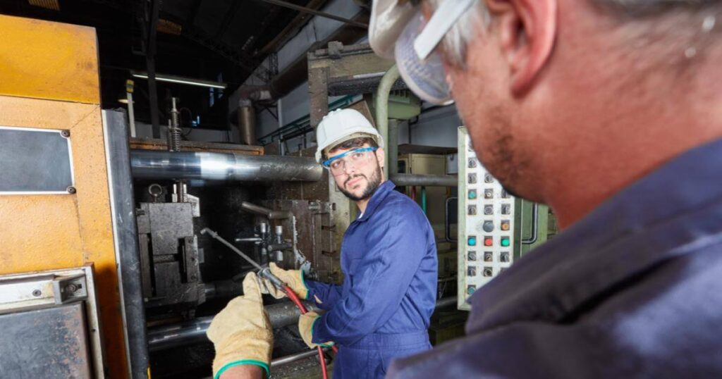 older and younger manufacturing workers