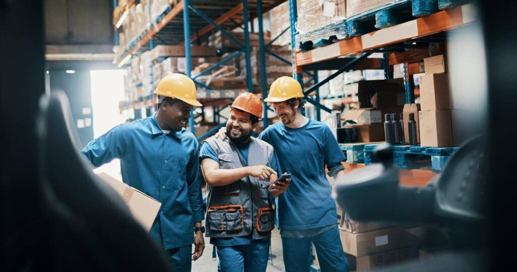 logistics workers laughing