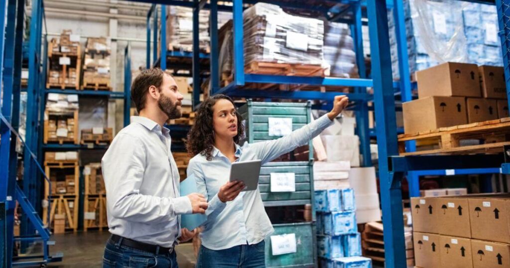 distribution manager giving feedback to employee